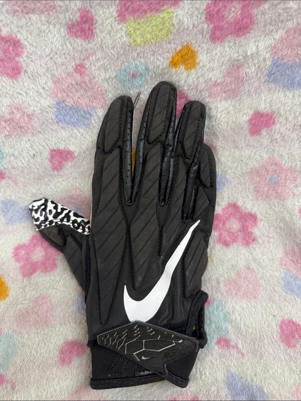 Nike Black Glove with White Swoosh and Zebra-Print Thumb